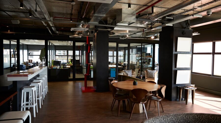 Bar and dining area in the office of a creative business, in daylight, no people