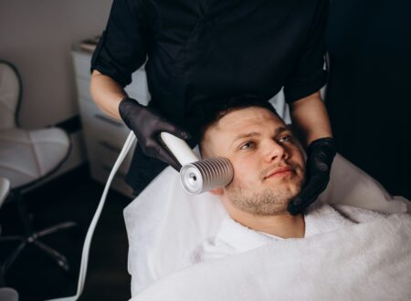 Face cryomassage, caucasian man. Skin cryotherapy close up. Liquid nitrogen use in medicine