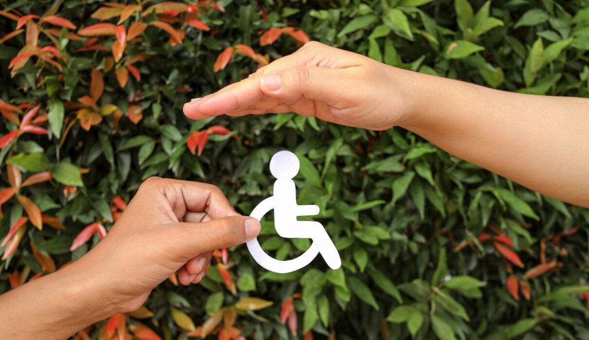 Hands Holding And Protecting Disability Icon Paper