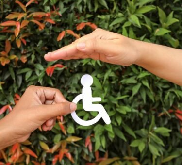 Hands Holding And Protecting Disability Icon Paper