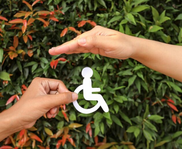 Hands Holding And Protecting Disability Icon Paper