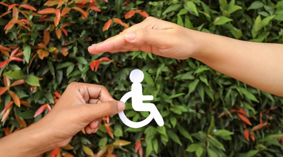 Hands Holding And Protecting Disability Icon Paper