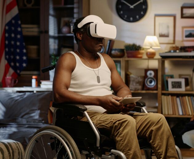 Retired Black Man Using Modern Gadgets While Staying at Home