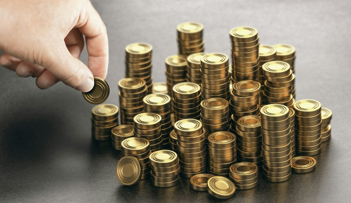 Rich man stacking golden money coins. Income saving plan.