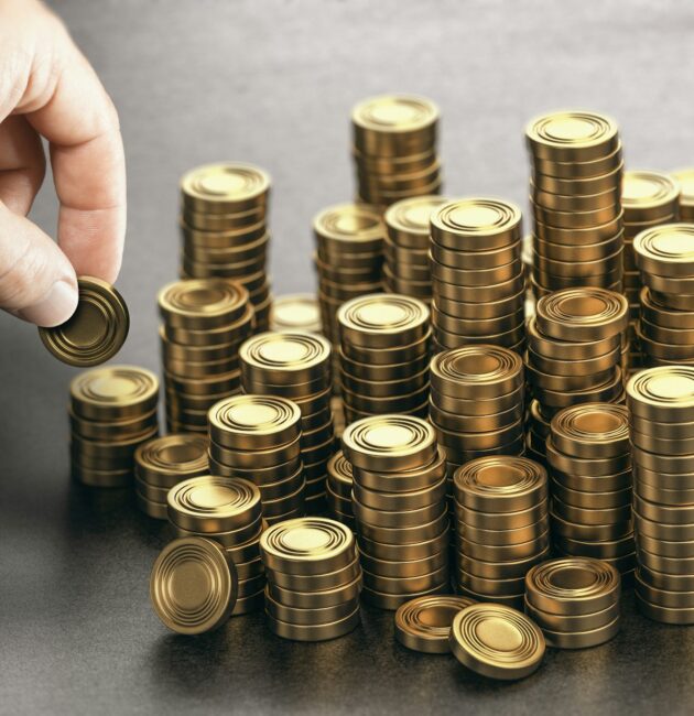 Rich man stacking golden money coins. Income saving plan.