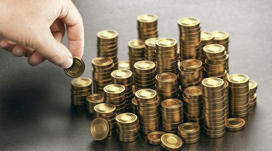 Rich man stacking golden money coins. Income saving plan.